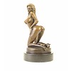 Bronze sculpture of a kneeling female nude in stockings and high heels