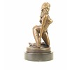 Bronze sculpture of a kneeling female nude in stockings and high heels