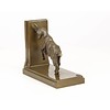 A bronze goat bookend