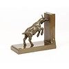 A bronze goat bookend