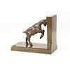 A bronze goat bookend