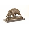 A bronze sculpture of a wild boar