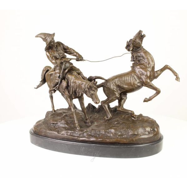  A bronze sculpture of a Kyrghiz capturing a wild horse