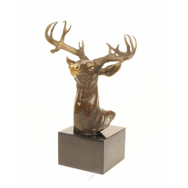  A bronze sculpture of a stag head