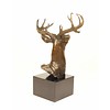 A bronze sculpture of a stag head