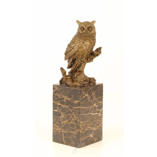  A bronze sculpture of a long-eared owl