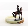 A bronze figurine of Napoleon on horseback ashtray