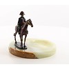 A bronze figurine of Napoleon on horseback ashtray