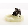 Een onyx asbak met twee bronzen bulldog pups