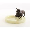 Een onyx asbak met twee bronzen bulldog pups