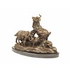 A bronze sculpture of a goat family