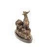 A bronze sculpture of a goat family