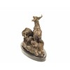 Een bronzen beeld van een groep geiten