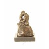 A small bronze sculpture of 'The Kiss' after Rodin