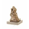 A small bronze sculpture of 'The Kiss' after Rodin