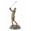 A bronze sculpture of a golfer in follow through stance