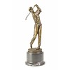 A bronze sculpture of a golfer in action