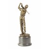 A bronze sculpture of a golfer in action