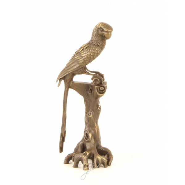  A bronze sculpture of a Macaw parrot perched on a branch