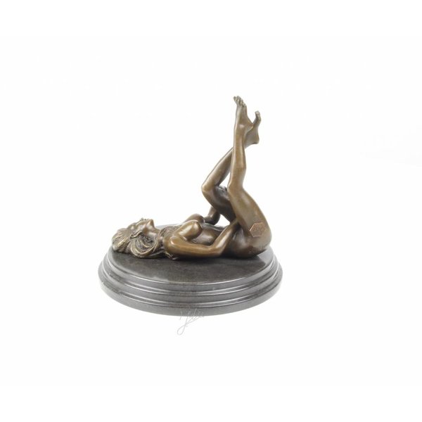  An erotic bronze sculpture of a naked female pleasing herself