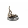 An erotic bronze sculpture of a naked female pleasing herself