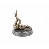 An erotic bronze sculpture of a naked female pleasing herself