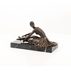Bronze sculpture of an Art Deco sitting female dancer