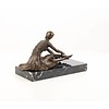 Bronze sculpture of an Art Deco sitting female dancer