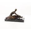 Bronze sculpture of an Art Deco sitting female dancer