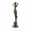 A bronze sculpture of a female Egyptian dancer