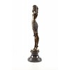 A bronze sculpture of a female Egyptian dancer