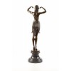 A bronze sculpture of a female Egyptian dancer