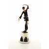 A large bronze sculpture of a graceful dancer with wooden inlay