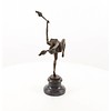 A bronze sculpture of a flame leaper