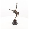 A bronze sculpture of a flame leaper