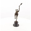 A bronze sculpture of a flame leaper