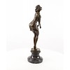 A large bronze sculpture of a pensive female