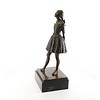 A bronze sculpture of the Little Dancer Aged Fourteen