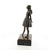 Een bronzen beeld van het veertienjarige danseresje van Degas