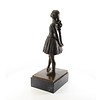 A bronze sculpture of the Little Dancer Aged Fourteen