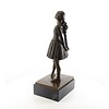 Een bronzen beeld van het veertienjarige danseresje van Degas