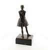 A bronze sculpture of the Little Dancer Aged Fourteen