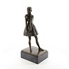 A bronze sculpture of the Little Dancer Aged Fourteen