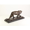 Bronze sculpture of a hunting panther