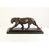 Bronze sculpture of a hunting panther