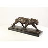 Bronze sculpture of a hunting panther