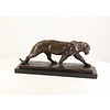 Bronze sculpture of a hunting panther