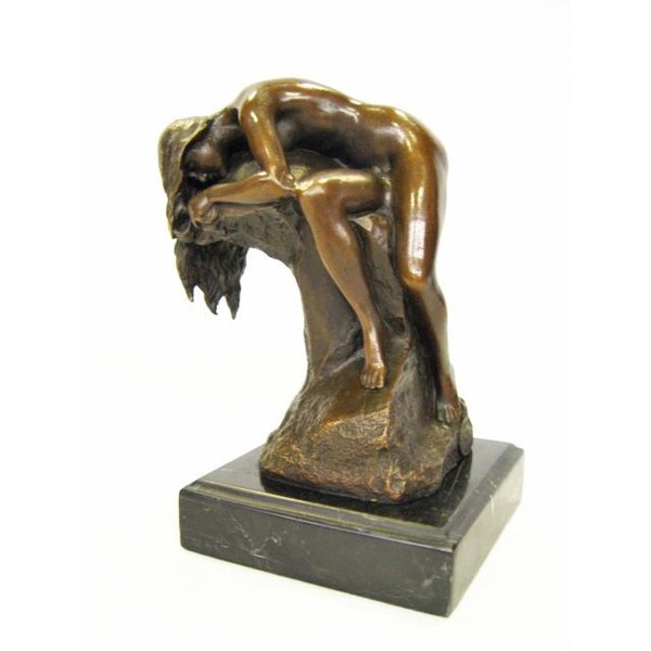  A bronze sculpture of a sleeping nude female