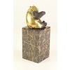 Bronze sculpture of a sitting Panda bear