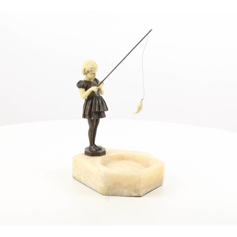 Ashtray with girl holding a fishing rod